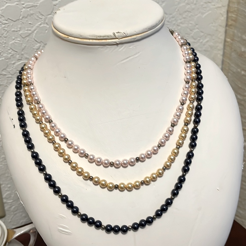 Three tier necklace of pale pink, gold and blue beads